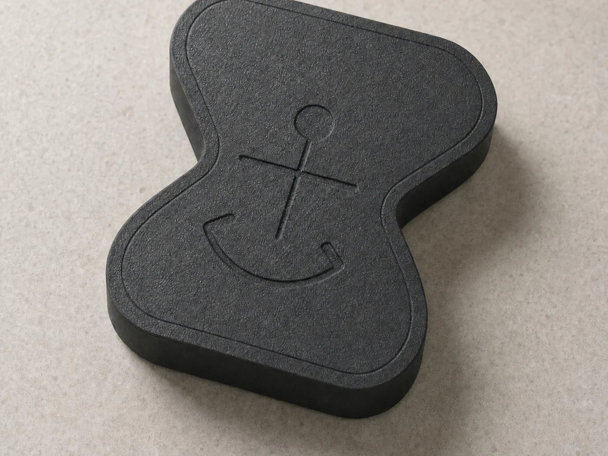Close-up detail of the matte-black Anchor physical app blocker